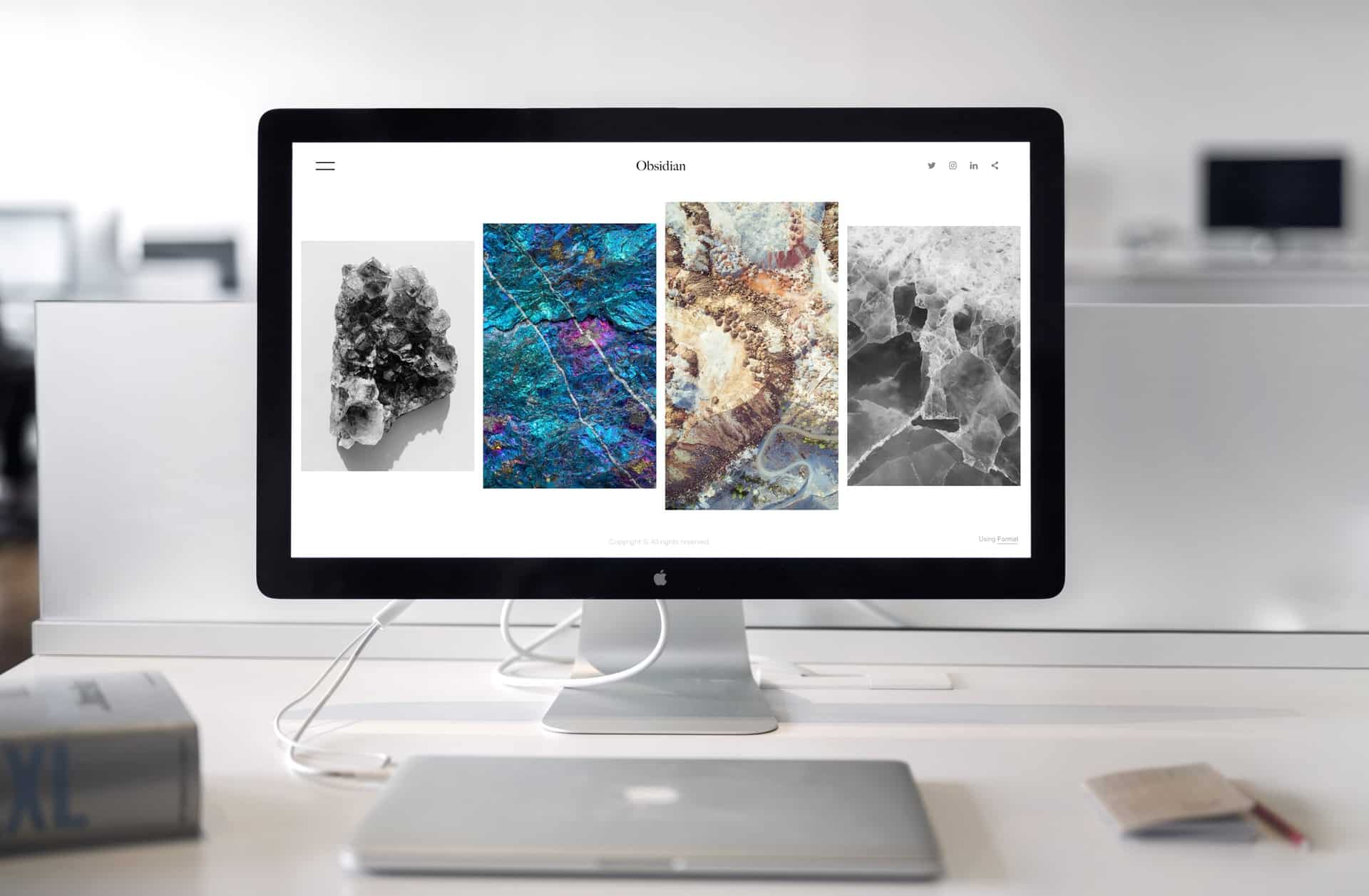 photo-of-imac-near-macbook-1029757